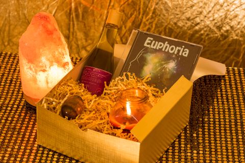 photo of Goddess Gift Box with yoni oil, Euphoria CD, candle and goddess yoni egg.