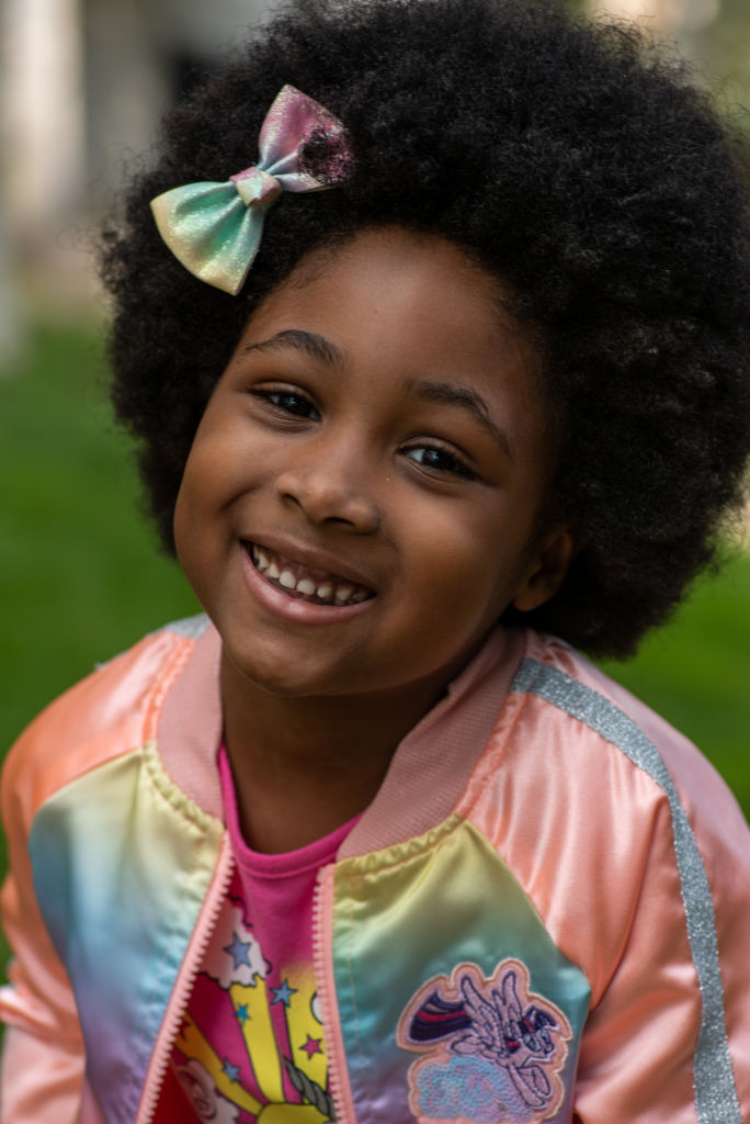 child headshots in Los Angeles with African American girl with afro